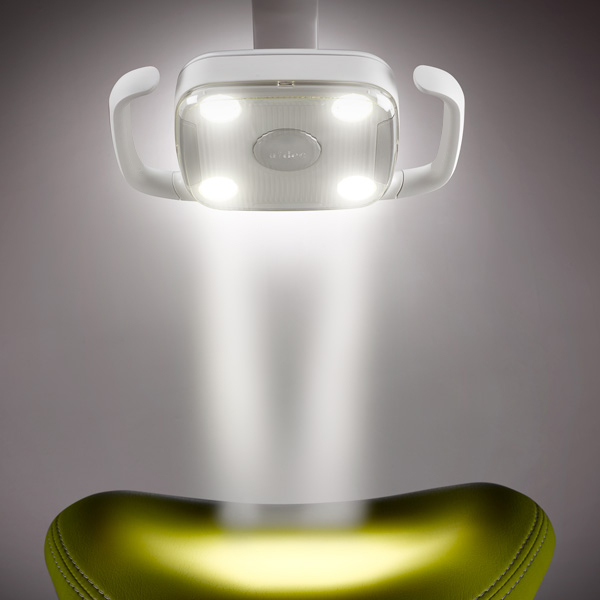 A-dec 300 LED dental light illuminating dental chair