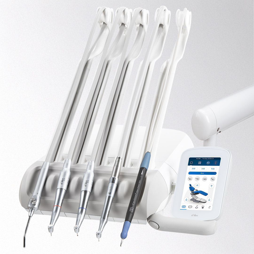 A-dec 300 Pro delivery system with Continental-style whip arms supporting dental handpieces