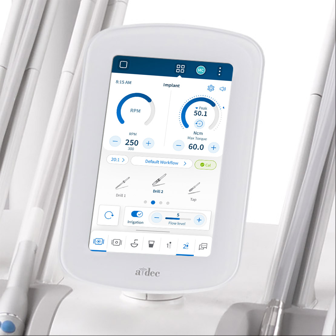 DS7 touchscreen on an A-dec 500 Pro delivery system showing an implantology workflow on the screen