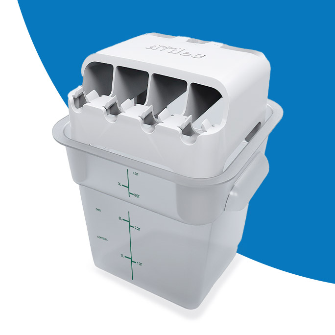 A-dec Flush Dock on top of a bucket with a blue circle in the background