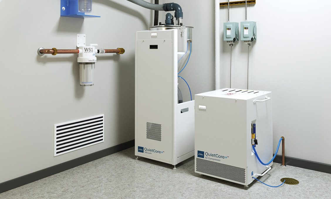 QuietCore+ dental air compressor and dental vacuum inside a mechanical room