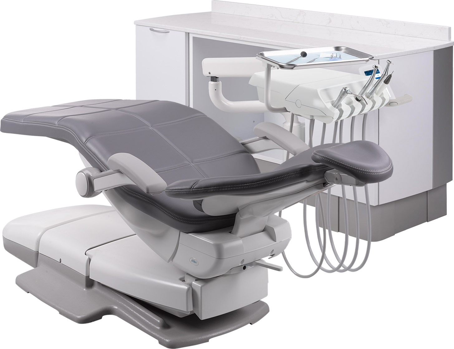A-dec 342 side delivery system mounted on a dental cabinet positioned next to an A-dec 500 dental chair