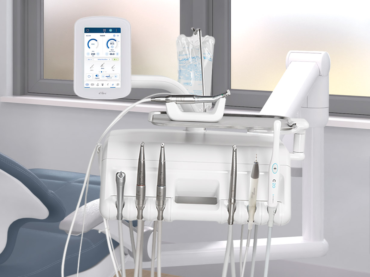 Integrated implantology dental devices integrated with an A-dec delivery system